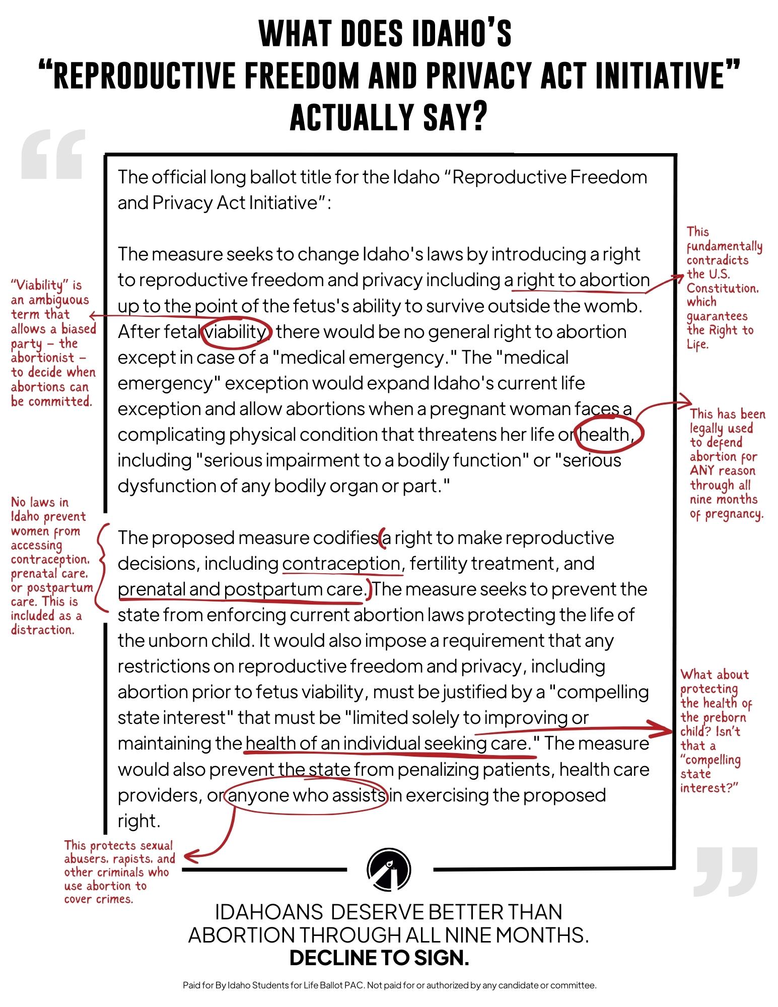 A group of people stand and sit closely together, smiling at the camera.